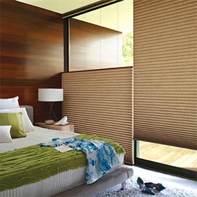 bedroom interior with honeycomb blinds