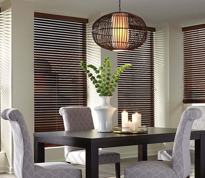 dining room interior featuring dark vertical blinds