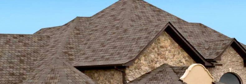 Roofing_Shingles_790x271 wide shot showcasing brown asphalt shingles
