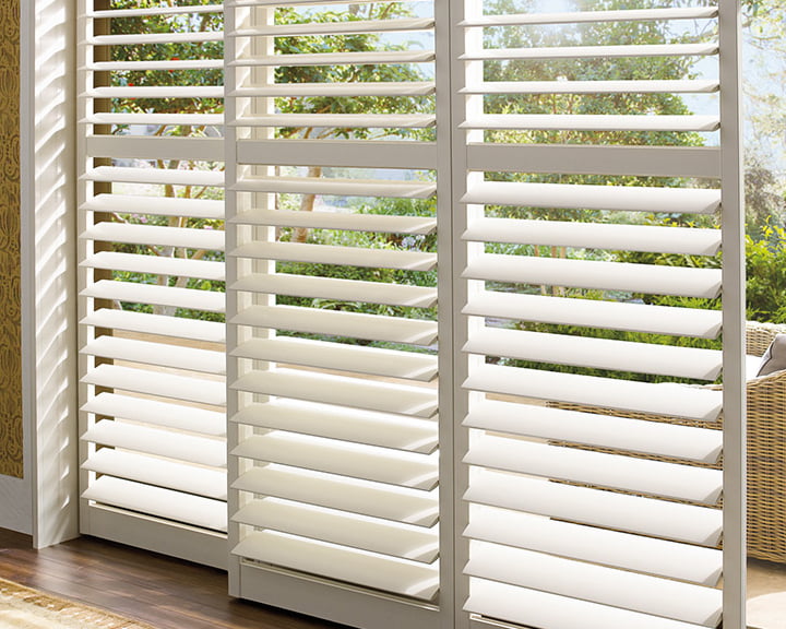 Shutters patio doors featuring white shutters
