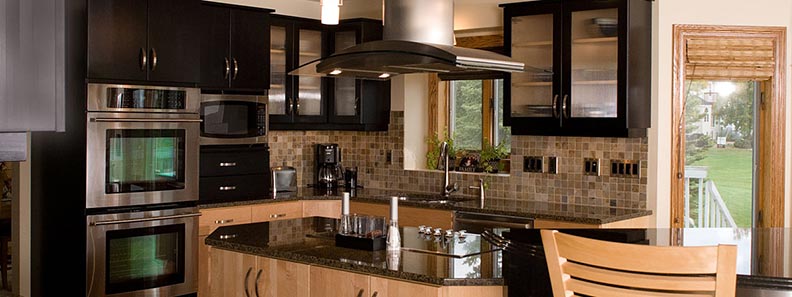 Frazee kitchen with dark and light wooden Crystal Cabinets