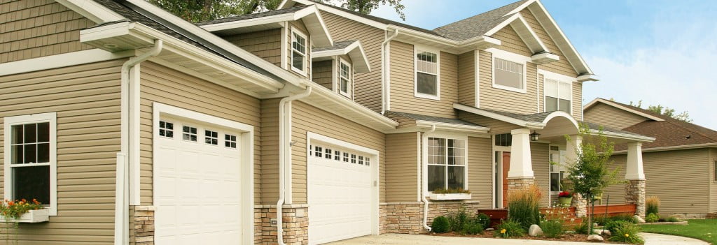 Monticello home with tan stainless steel siding
