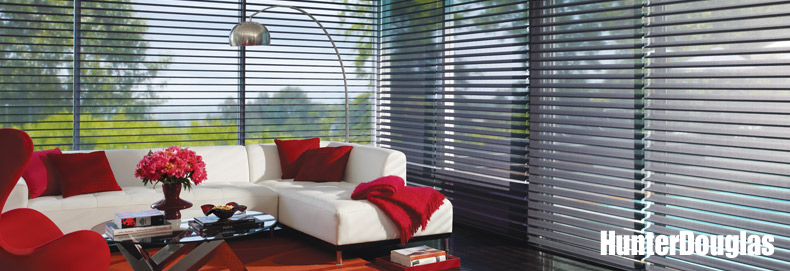 home interior featuring large windows with slatted hunter douglas blinds