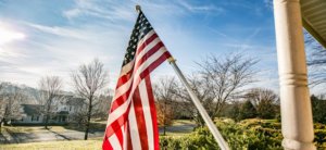 American flag hanging on a porch