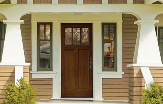 Brown entry door with three windows