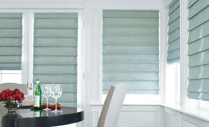 HomeandLeisure_LandingPageHunterDouglas_425x260 light blue slat Hunter Douglas blinds in kitchen