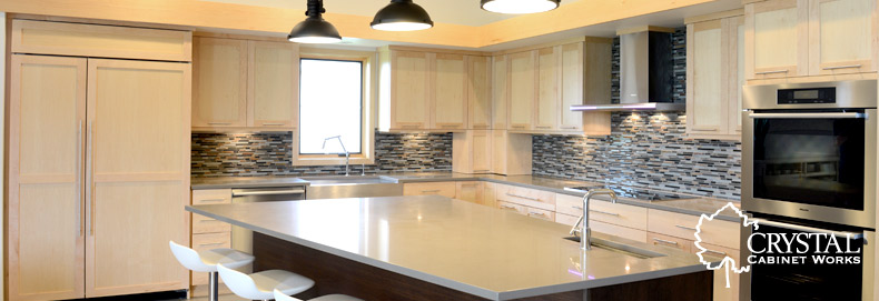 bright kitchen with Crystal Cabinets that have a cabinet warranty