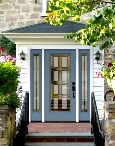 blue ProVia doors with three decorative windows and dark, elegant handle on white house with small stairway walkup