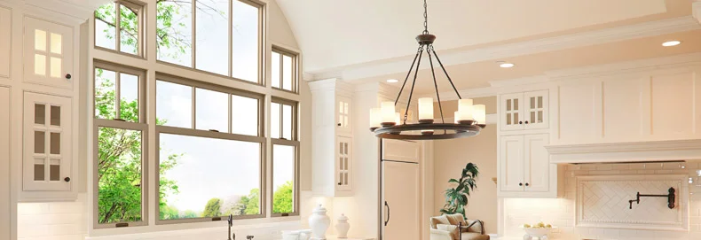 RBA_DoubleHungWindows_790x271 home interior kitchen with three double hung windows and accent windows above