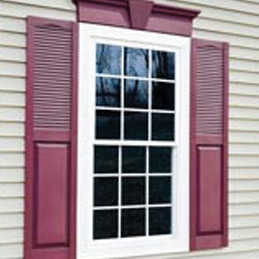 window accents featuring red shutters