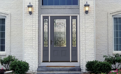 blue steel Therma-Tru door with three decorative windows on a white house