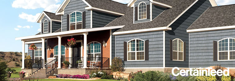 home featuring blue CertainTeed accent siding