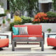 elements air seating with coral fabric surround dark mode table in outdoor area