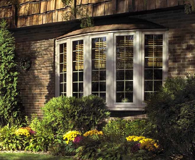 home exterior bow windows creating curb appeal