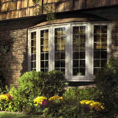 home exterior bow windows creating curb appeal