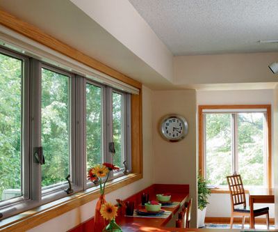 home interior casement windows spanning whole room wall