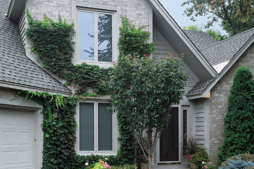 two home exterior casement windows pair with house style
