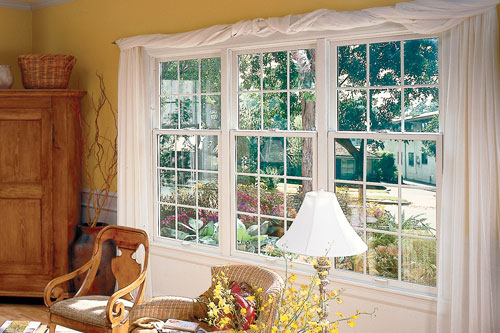 home interior living room double hung windows with decorative grilles