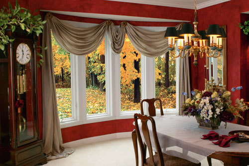 home interior dining room large picture windows decorated with draping curtains
