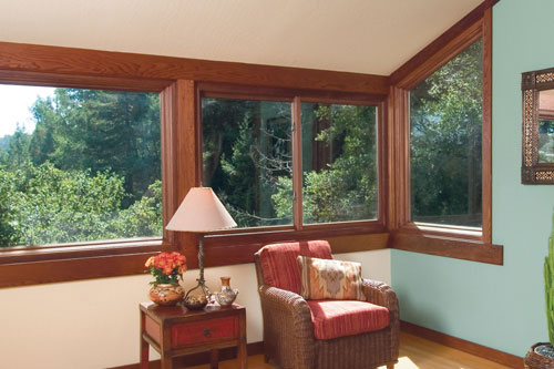 home interior living room four sliding / gliding windows provide natural sunlight