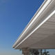 white soffit and fascia finish the overhang of a deck or patio