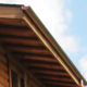 brown soffit and fascia matches the color and style of a log home